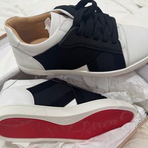 Christian Louboutin Black and White Sneakers with Red Soles
